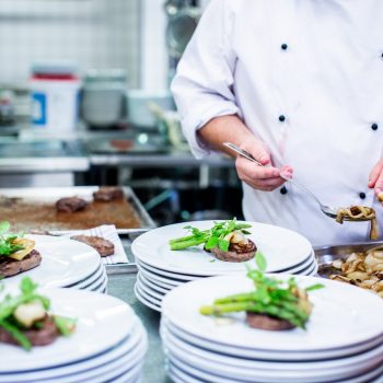 Close up shot of Chef Andrew Michael Alessi preparing food